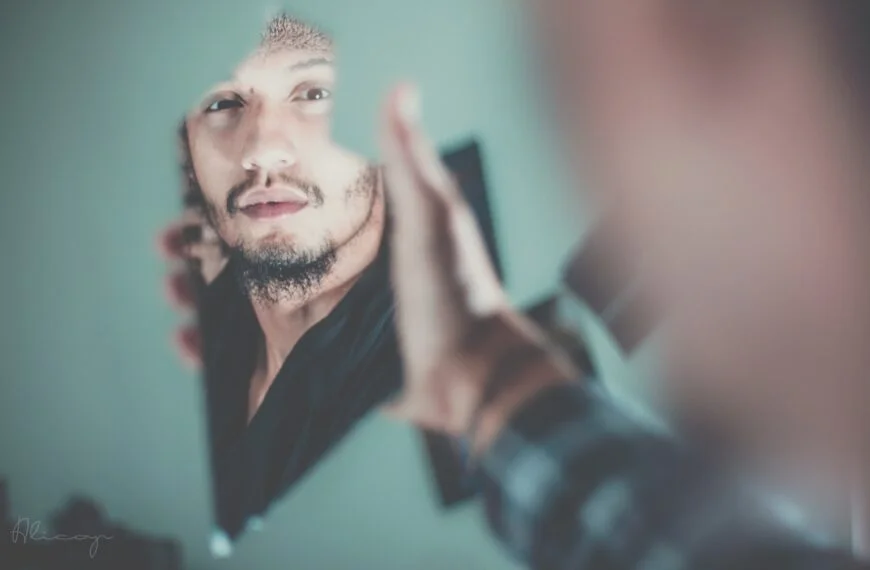 Taking compliments & why it matters 10 Selective Focus Photography Of Man'S Reflection On A Broken Mirror